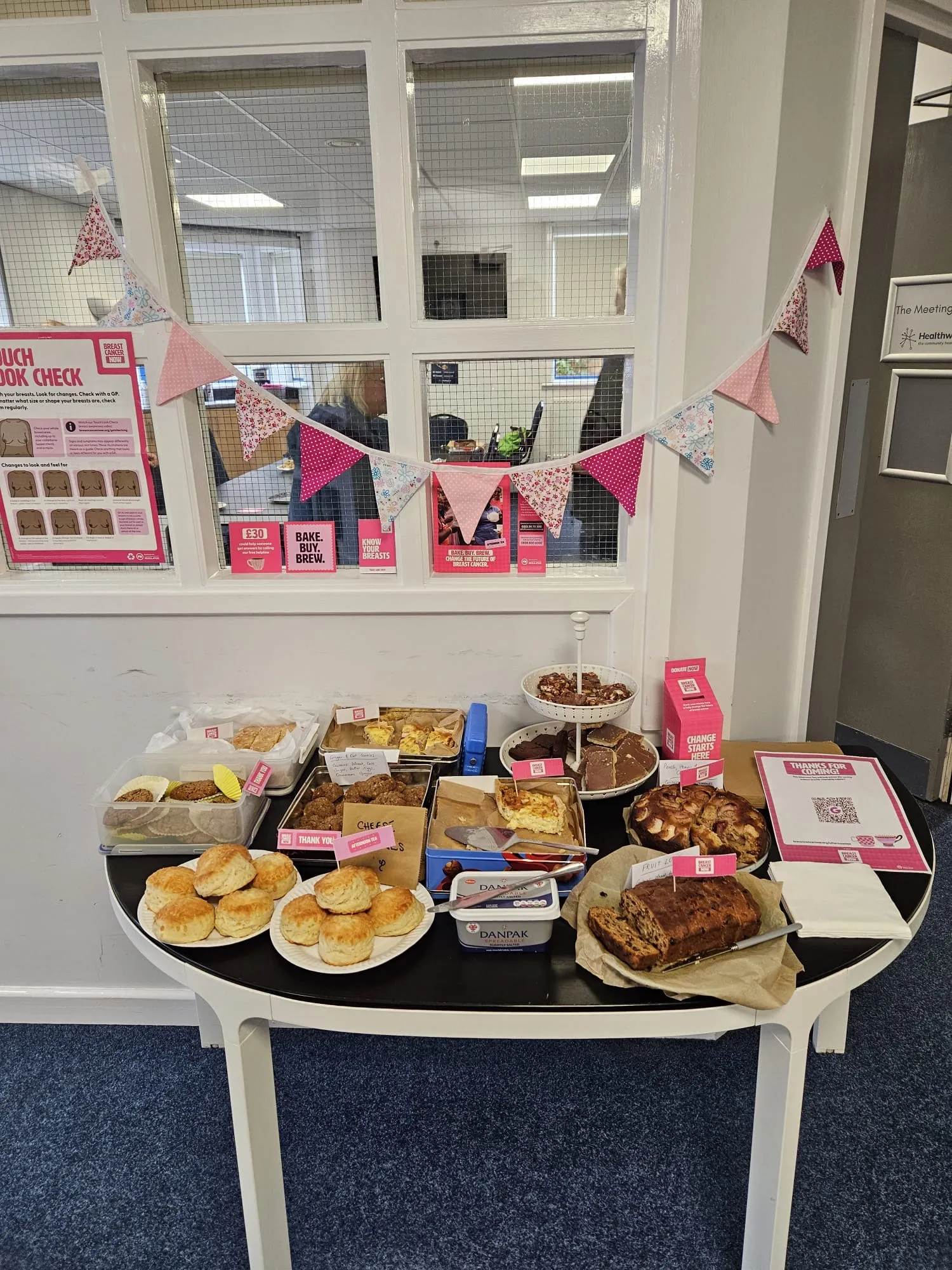 A cake sale organised by women attending a community physical activity programme in the PURE-EX trial.
